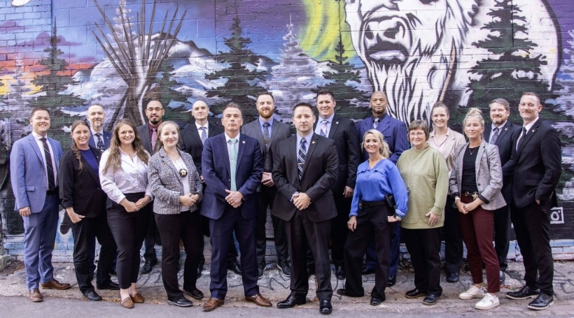 Captain Sperle and the Criminal Investigations Division (CID) Team